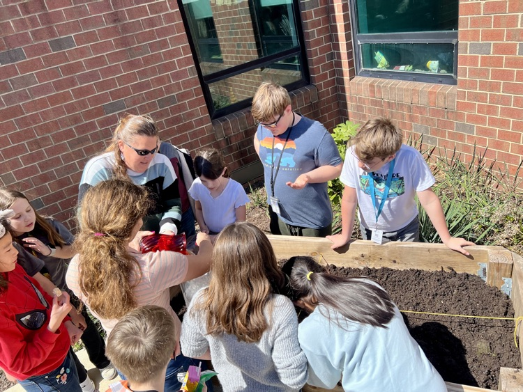 ButtsRoadInt's tweet photo. BRI's first student-led gardening club lunch bunch met in the courtyard today.  They planned out their sections, labeled with 3D printed tags, planted seeds, &amp; watered them.  They learned about soil, spacing, and the magic of banana water.  #SOARingHighatBRI https://t.co/ziY685HcgZ