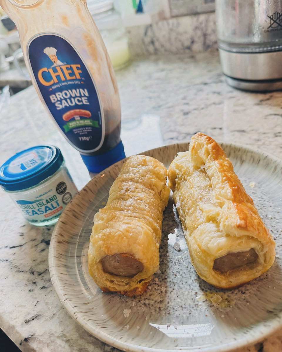 A thing of beauty & taste of home; sausage rolls with a sprinkle of @achillseasalt & a squeeze of #ChefIreland #BrownSauce - are you a brown or red, or have an alternative?? It’s an Irish thing iykyk 😉 #sausagerolls #redsauceorbrown #achillisland #foodofireland 🇮🇪 🔴 🟤