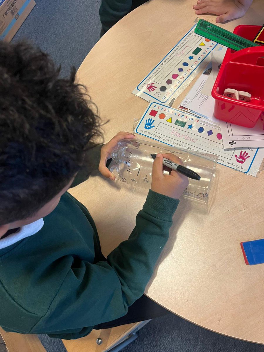 vincents_st's tweet photo. Primary 2/1 have been making rain gauges to measure rainfall. We recycled our plastic bottles and used our rulers to mark out lines in centimetres. #STEMGlasgow https://t.co/oqlCadxdqk