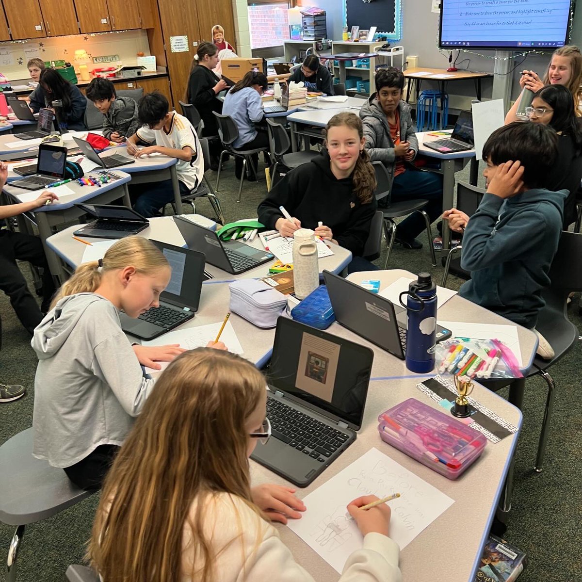 6thWithWright's tweet photo. Sharing their biographies with a partner in our “celebration” stage of our writing process. Their partner was challenged with reading and illustrating a cover based on the information they learned from their classmate’s writing. We ended with a gallery walk to share! #hooverhawks https://t.co/ykFREWRxxH