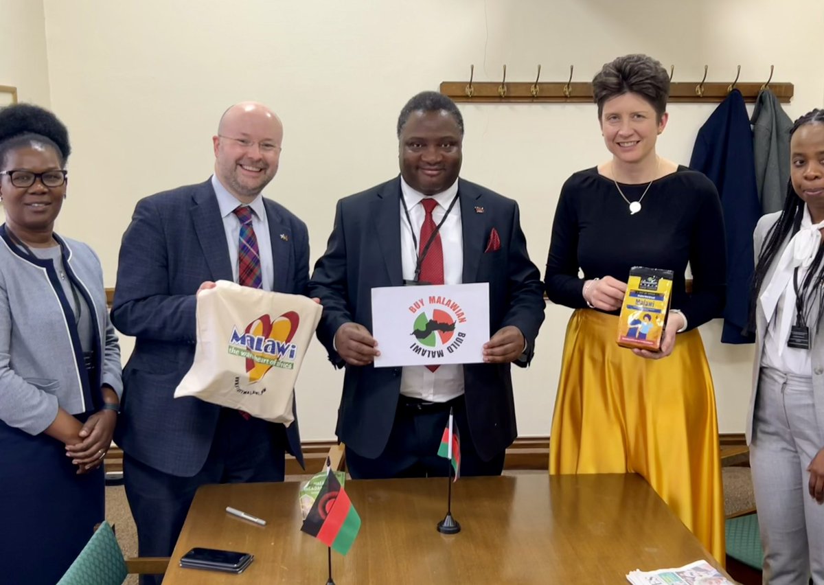 His Excellency, the Malawi High Commissioner, @TBisika (centre) recognised #BuyMalawiDay today, presenting Malawi All-Party Parliamentary Group Chair, @GradySNP MP with some Malawi goodies, following the APPG’s AGM in Westminster Hall, London.