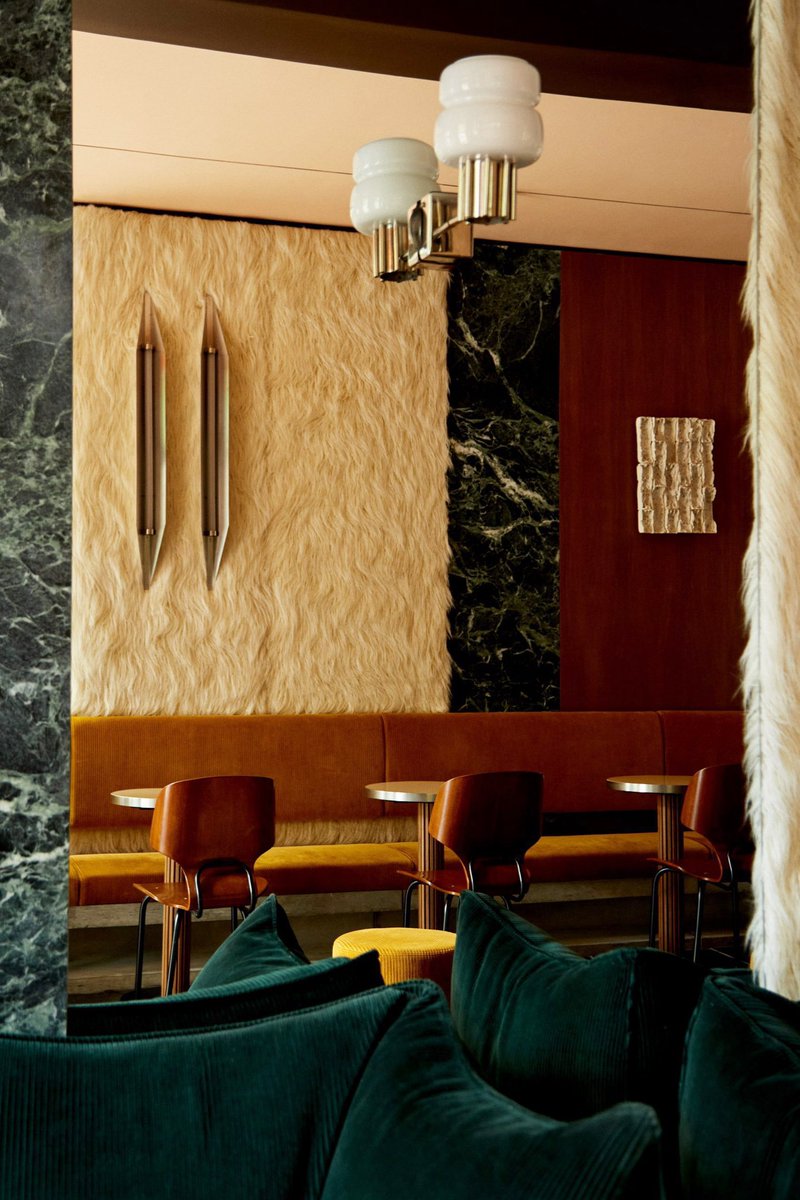 luusssso's tweet photo. This cafe in Aspen, Colorado has green marble and faux fur lined walls and I’m in awe https://t.co/Ty6EajfGAE