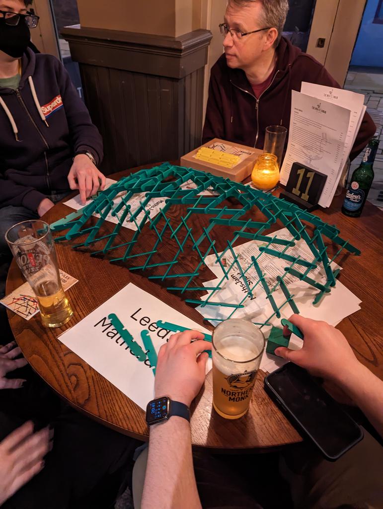 Great turnout for the first MathsJam back in person in Leeds! We built some Leonardo domes, collected worms in Heckmeck, and had a look a some original prototype aperiodic monotiles!

[Max]