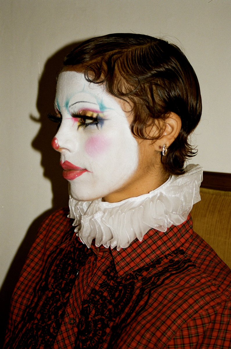 dopemo's tweet photo. nobody’s clown 🤡  shot by me 
makeup by @mstesstickle https://t.co/vx694FfRR7
