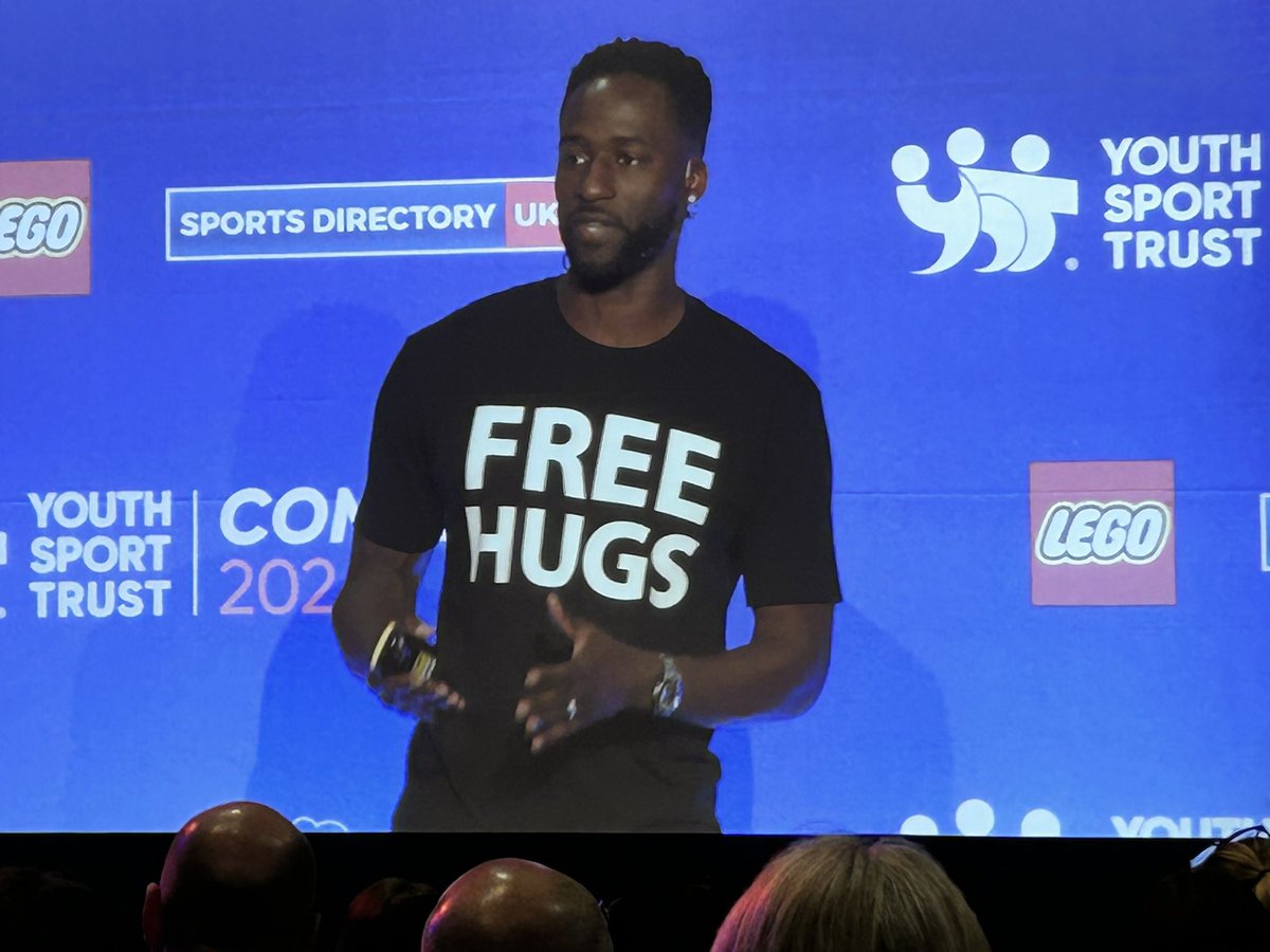 Absolutely awesome to hear from @KenNwadikeJr about his incredible childhood, living in a homeless shelter and aspiring to become an athlete before founding the @FreeHugsProject to support homeless children & deal with conflict 😳🤗❤️ @YouthSportTrust #YSTConference