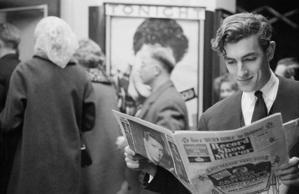 Peter Cook reads a copy of Record Show Mirror (1960) by John Bulmer #readingissexy