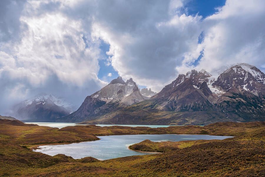 Rugged Patagonian landscape 2! buff.ly/3TrcOjz #patagonia #chile #mountains #landscape #sunbeams #clouds #peaks #rugged lakes #AYearForArt #BuyIntoArt #giftideas @joancarroll