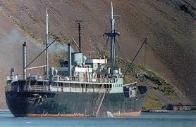 March 20th 1982: After observing the Argentine Naval Transport, ARA Bahia Buen Suceso still in port at Leith Harbour, Trefor Edwards of the British Antarctic Survey hands Captain Briatore a note from Governor Rex Hunt (continues)...