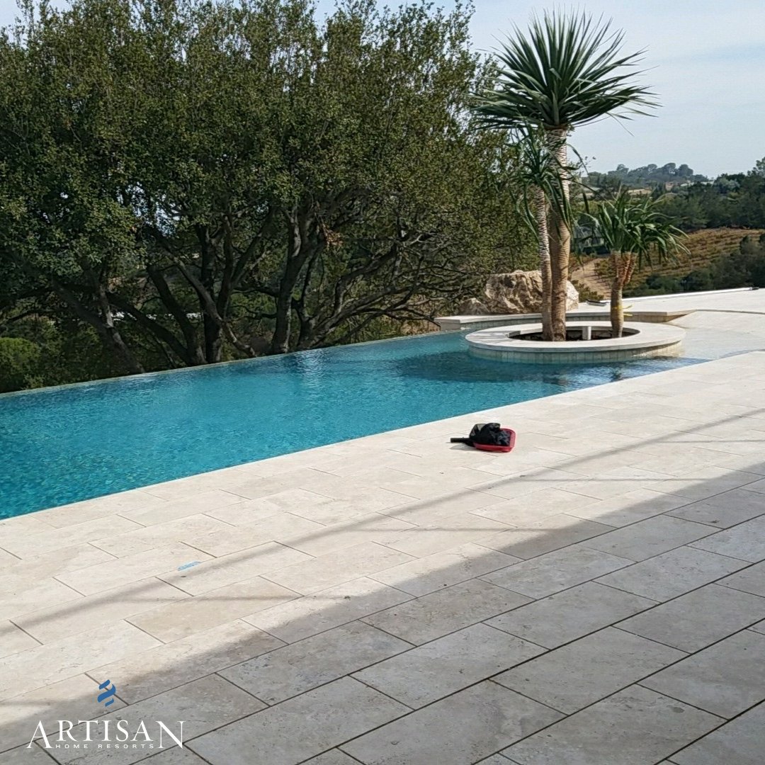 A beatiful hillside pool designed by our team at Artisan Home Resorts ✨ View our full portfolio by visiting: artisanhomeresorts.com/portfolio/