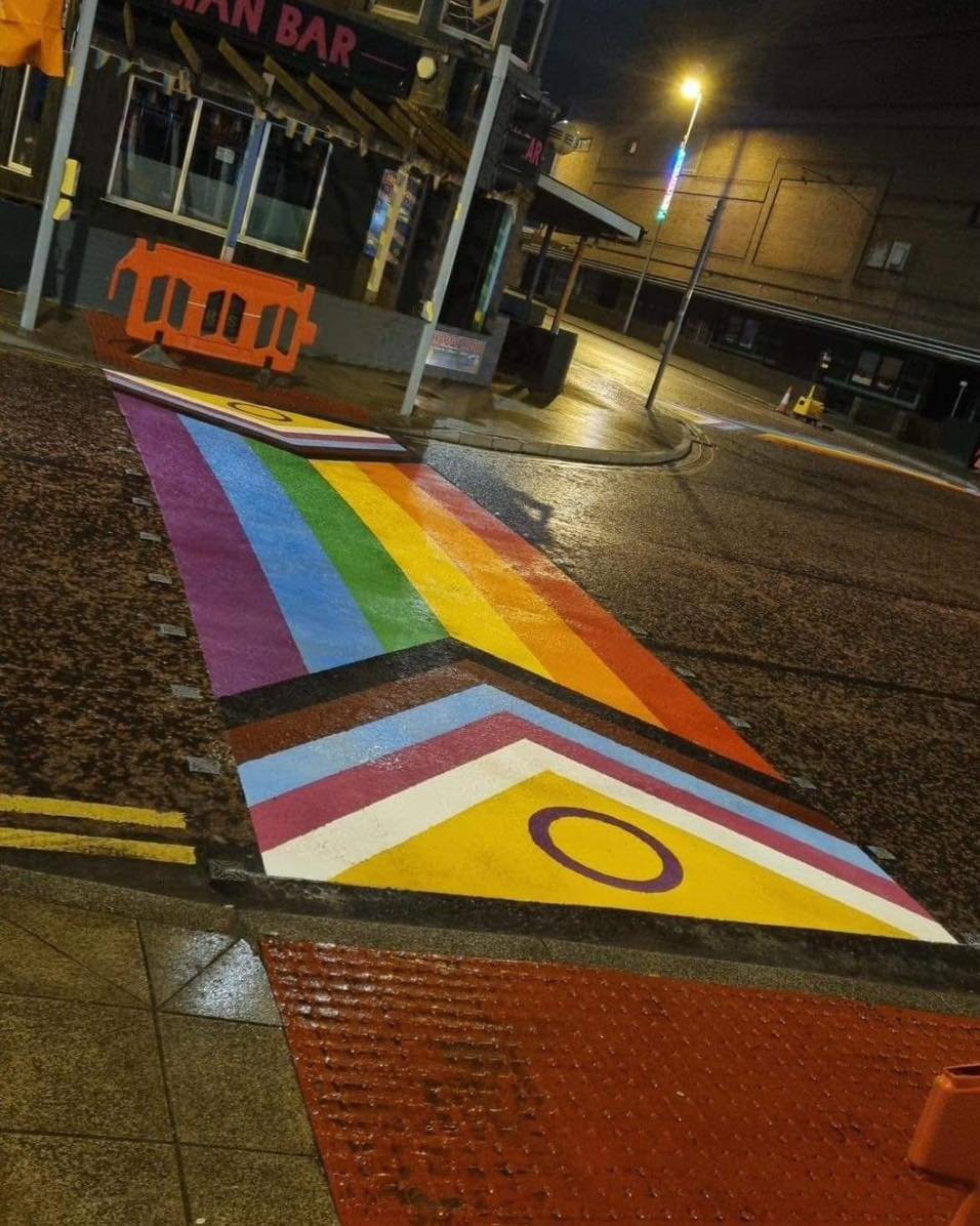the_BPL_bible's tweet photo. One local said "As an LGBTQ lady (and driver), I think these markings are pointless. Blackpool has some terrible roads, and the money could be much better spent on sorting out potholes etc.
I don't need flags and rainbows painted on a road to feel confident about myself https://t.co/AdZkezqHtM
