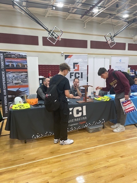 Students interact with employer at CCHS College and Career Fair