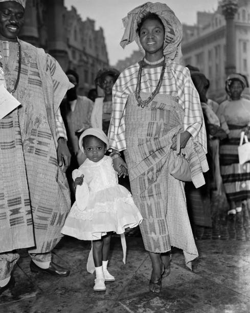 Yoruba couple with their daughter arrive at Westminster Abbey for a service celebrating Nigeria's Independence, London. 

Date: 1st October 1960. 

Photo Credit: by John Franks/Keystone/Hulton Archive/Getty Images.

#ASIRIMagazine #nigeriahistorymatters #DigitalArchiving