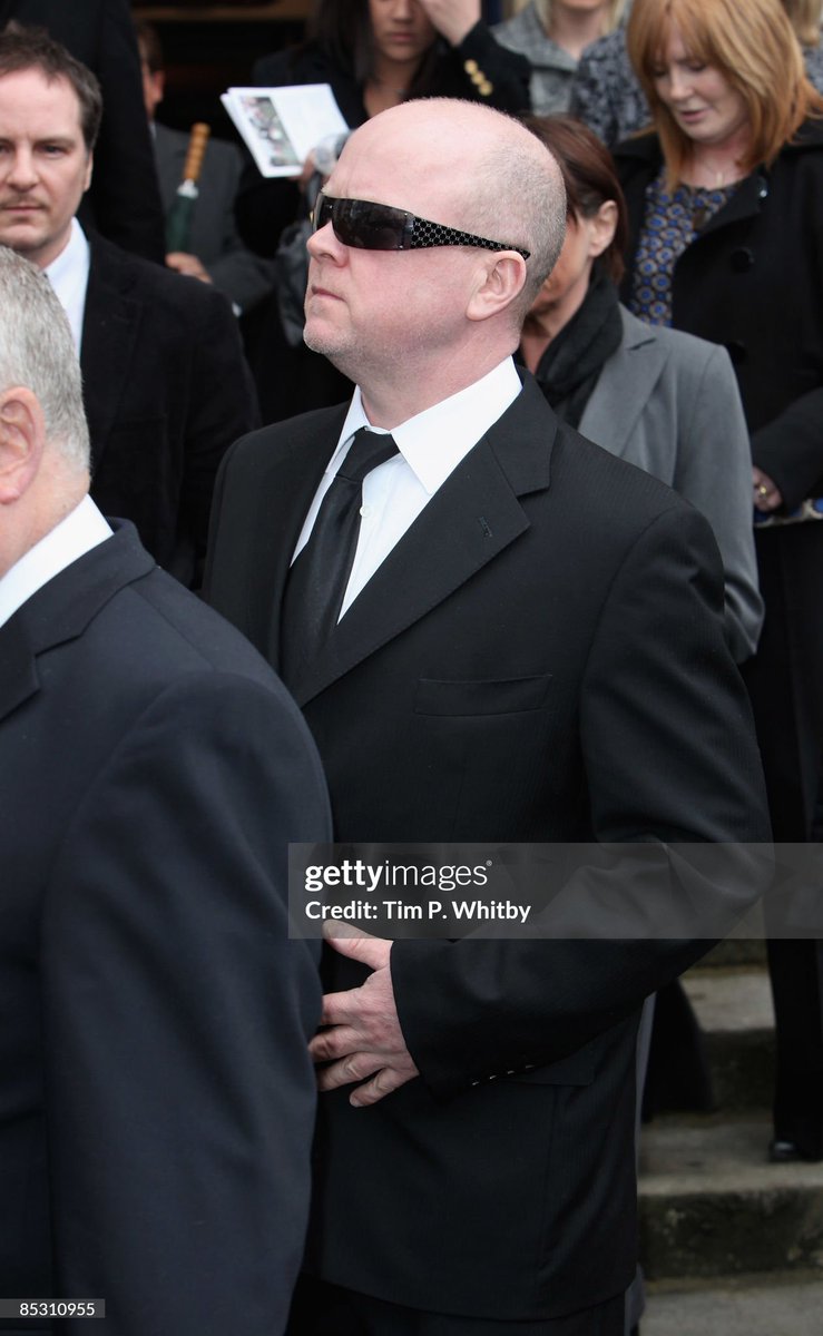 Steve McFadden is seen leaving the funeral of actress Wendy Richard at St Mary's Church, Marylebone High Street in London, England (2009)