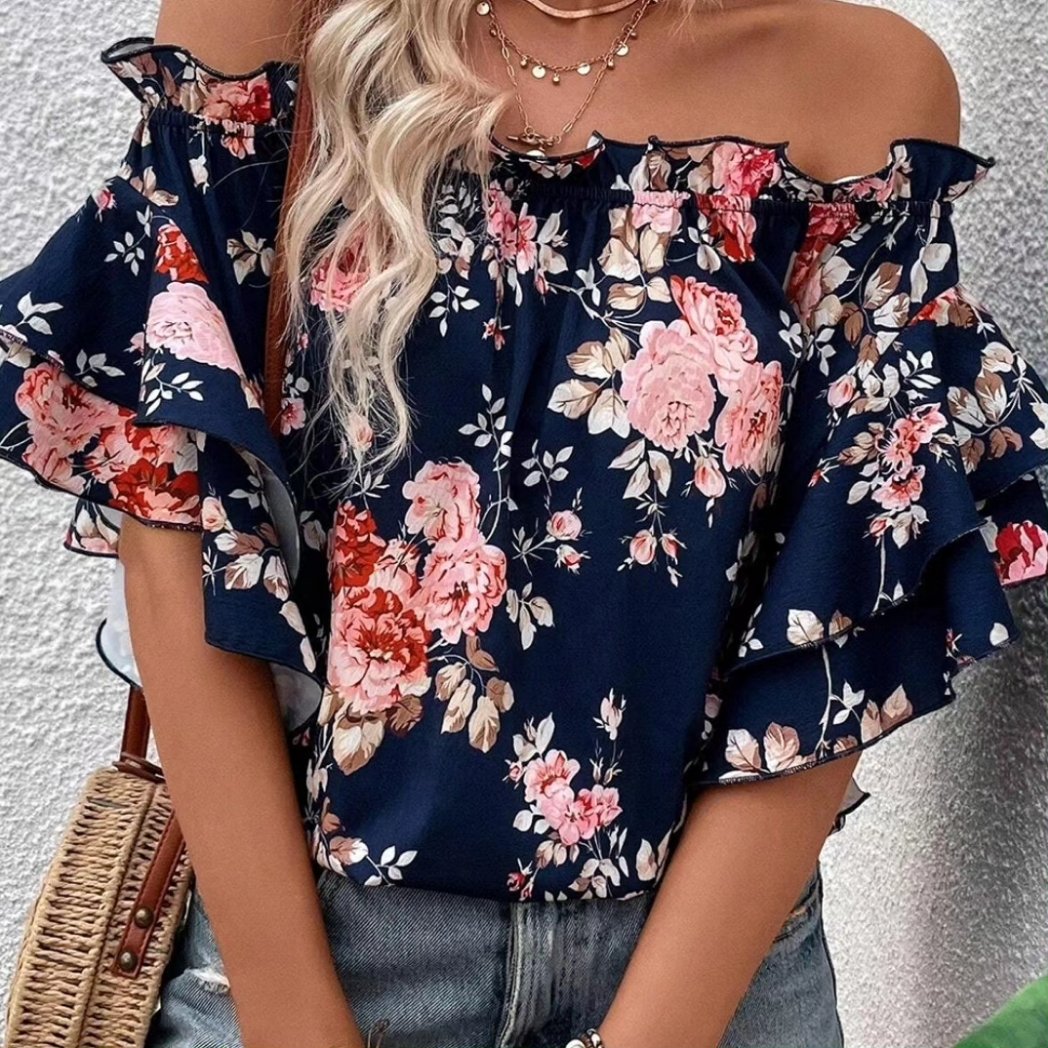 🌸 Elevate your spring wardrobe with our stunning Blue Off-the-Shoulder Floral Blouse!  Delicate blooms dance across soft, breathable fabric, perfect for warm days ahead.  #FashionFloral #SpringStyle #OffTheShoulder #FloralFashion #OOTD #WomensFashion #SpringVibes #FashionInsp