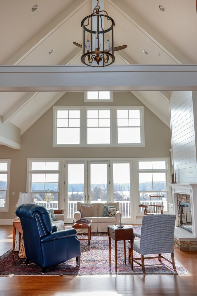 Room with a peaceful view.  No matter the season, this will be the place to park at the end of the day.

@AnnKottlerHome
@shannawolfsphotography

#roomwithaview #livingroom #windowwall #quiettime #readingroom