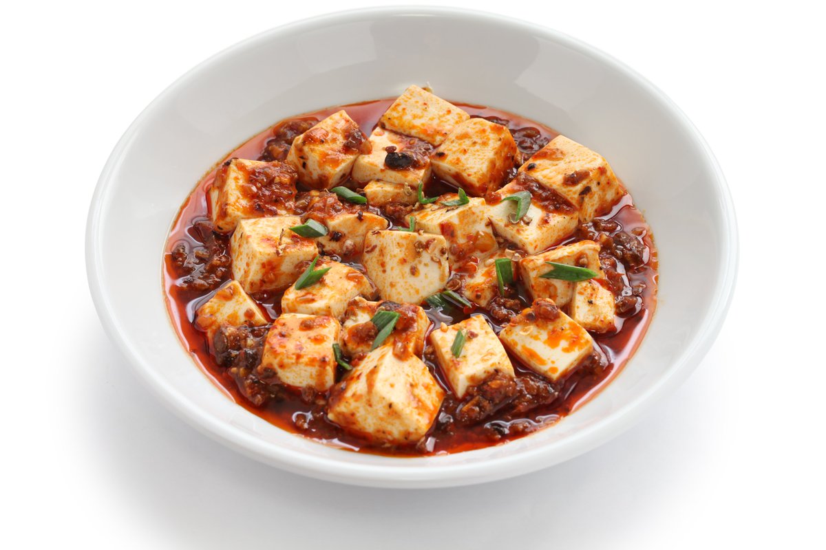 Mapo Tofu, celebrated for the harmonious blend of tofu and meat (or vegetable stock for vegetarians), stands as a beloved Sichuanese dish adored for its comforting flavors. Its richness is heightened by the bold depth of darker Sichuan chili bean paste. #ChineseCuisine #MapoTofu