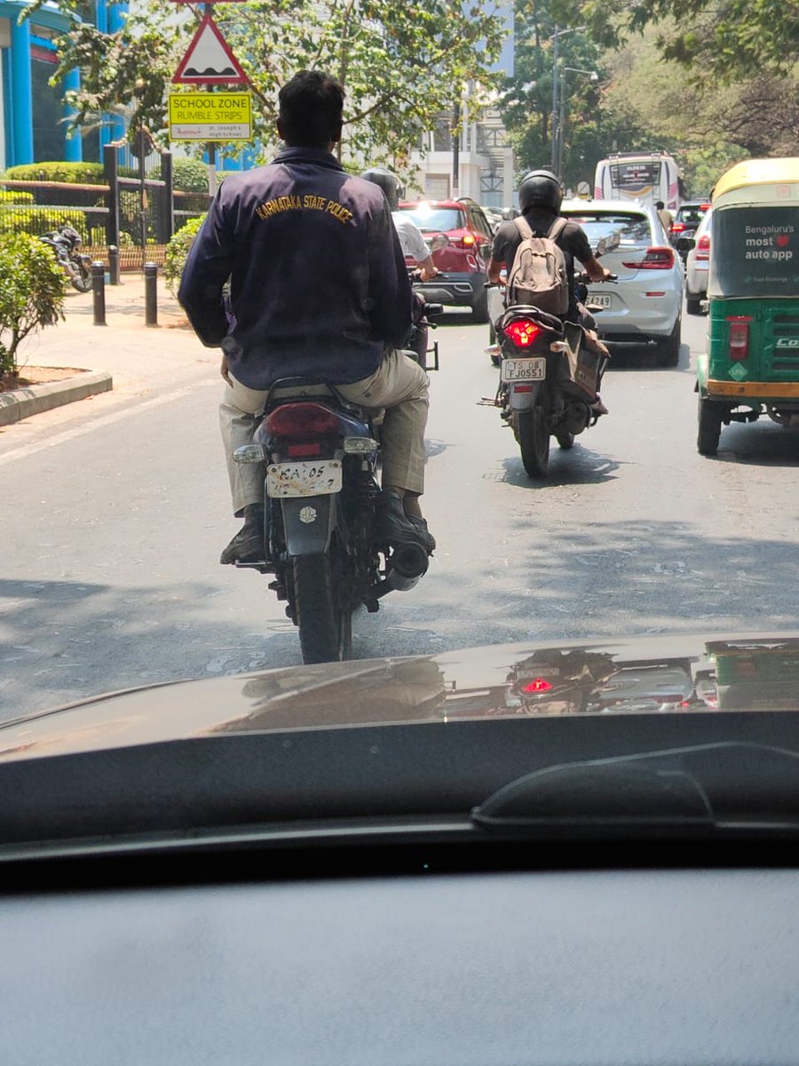What action will be taken ? Detective number plate . Rider and pillon rider not wearing helmet . Karnataka state police . <a href="/blrcitytraffic/">ಬೆಂಗಳೂರು ಸಂಚಾರ ಪೊಲೀಸ್ BengaluruTrafficPolice</a> <a href="/BlrCityPolice/">ಬೆಂಗಳೂರು ನಗರ ಪೊಲೀಸ್‌ BengaluruCityPolice</a>