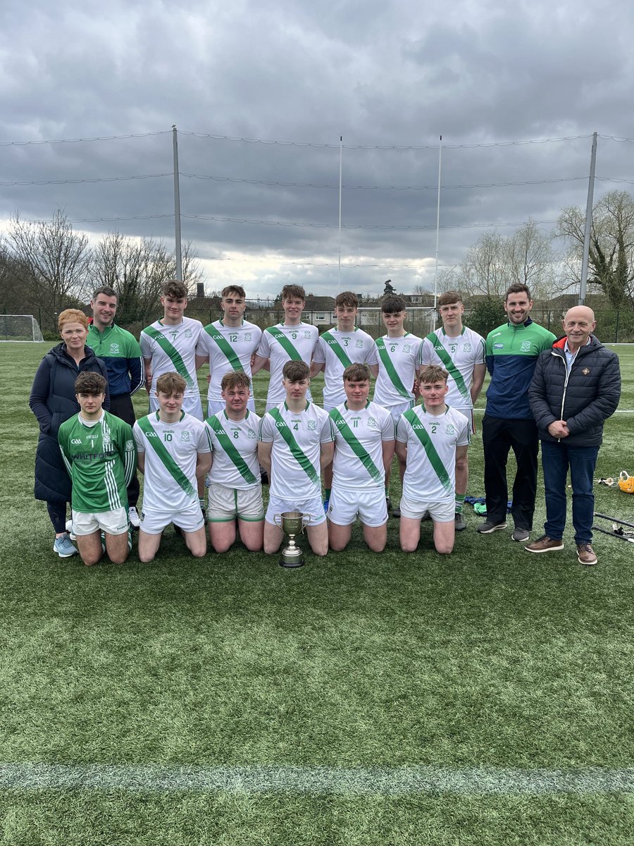 The victorious St. Peter’s 7 a-side hurling team, winners of the Jack Pettit Memorial 7s tournament in DCU today, pictured with Jacks parents Liam and Julie.