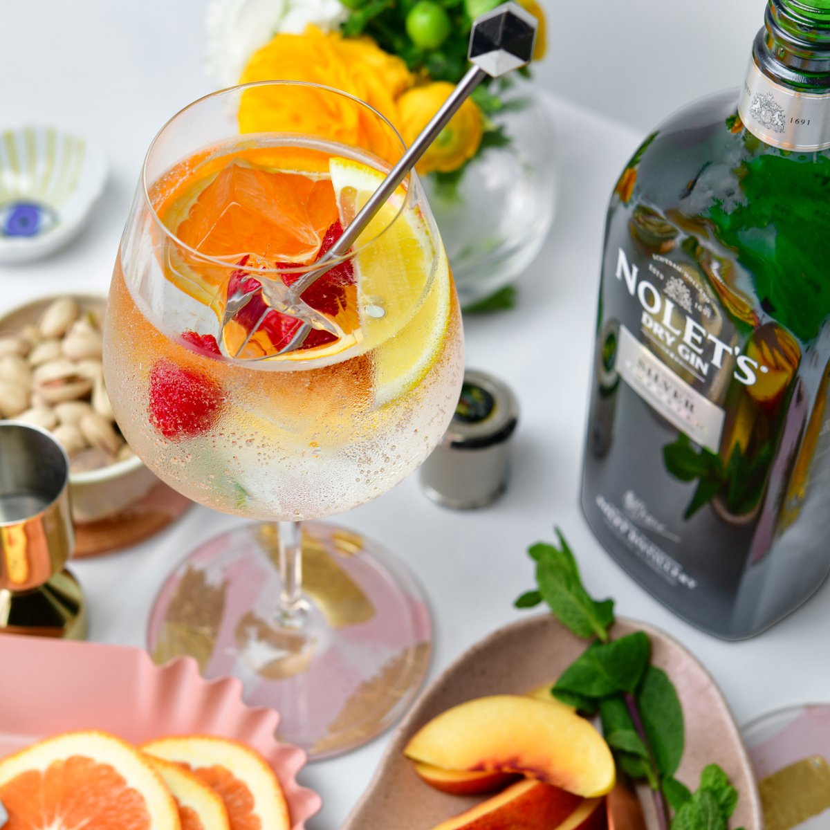 Signs of Spring = Spritz Szn! This one's garnished with unabashed enthusiasm! * please share your creations with us! Get the Botanical Spritz recipe from our websites Recipe section. #NOLETS #Spritz #SpritzSeason #Botanical #Cocktail #Recipe