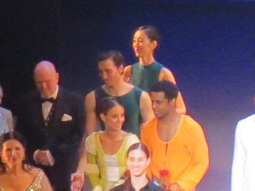 At the back you can see ENB dancers Gareth Haw and Sangeun Lee in dark teal leotards, with Camila Bocca and Osiel Gouneo in front of them . Graham Watts is in the tuxedo suit and the show promoter Olga Bakaleets is in the bottom left corner and the conductor Maria Seletskaja is in front of Camila and Osiel