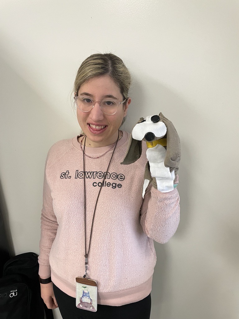 In this elective course, students participated in a puppet-making workshop to create a puppet with a purpose. This student created a puppet that looks like her new puppy to teach children not to be afraid of dogs, and to help them learn how to interact with puppies in a safe way.