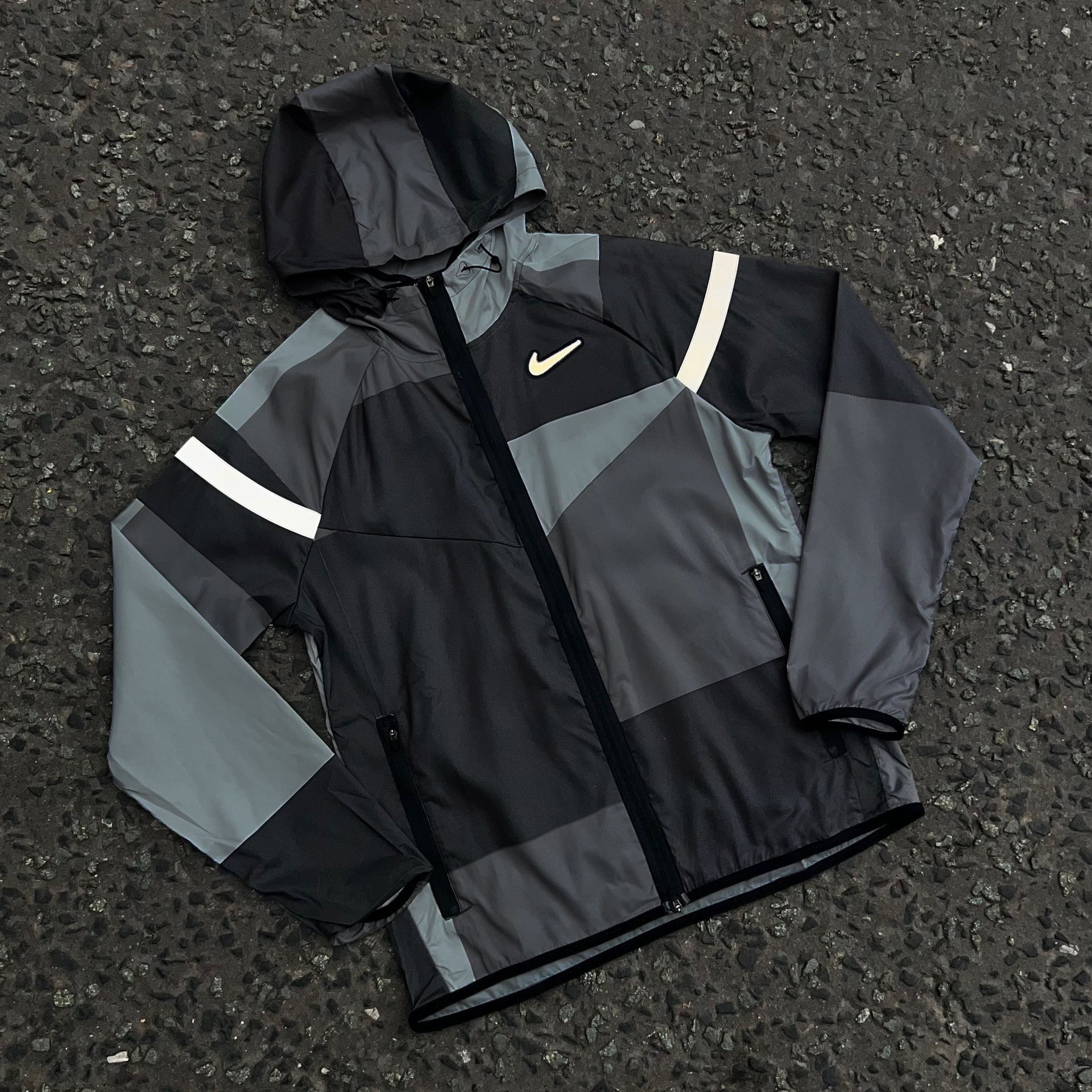 Nike wild run jacket grey hotsell