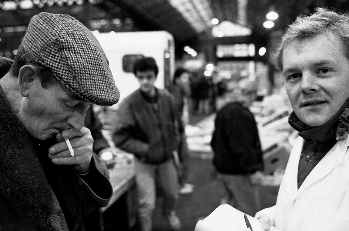 Faces of Spitalfields. Part of the documenting of the market before its relocation in 1991. Photobook Spitalfields91 is available @Bricklanebooks and @funkycellar in @oldspitalfieldsmarket . #blackandwhitephotography #market #vegtables #fruit #food #work #nightshift