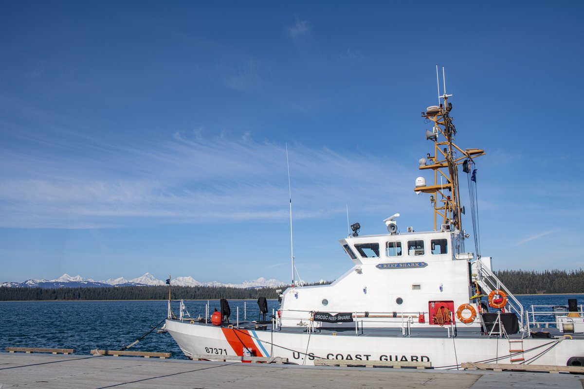 We were hoping for a baby shark appearance... but this will do. (doo doo, doo doo doo) Not sure what's more beautiful, this blue sky scenery, the Fairweather Range in the sun, or this bright and shiny USCG patrol boat adorning the Bartlett Cove dock today. @USCG @USCGAlaska