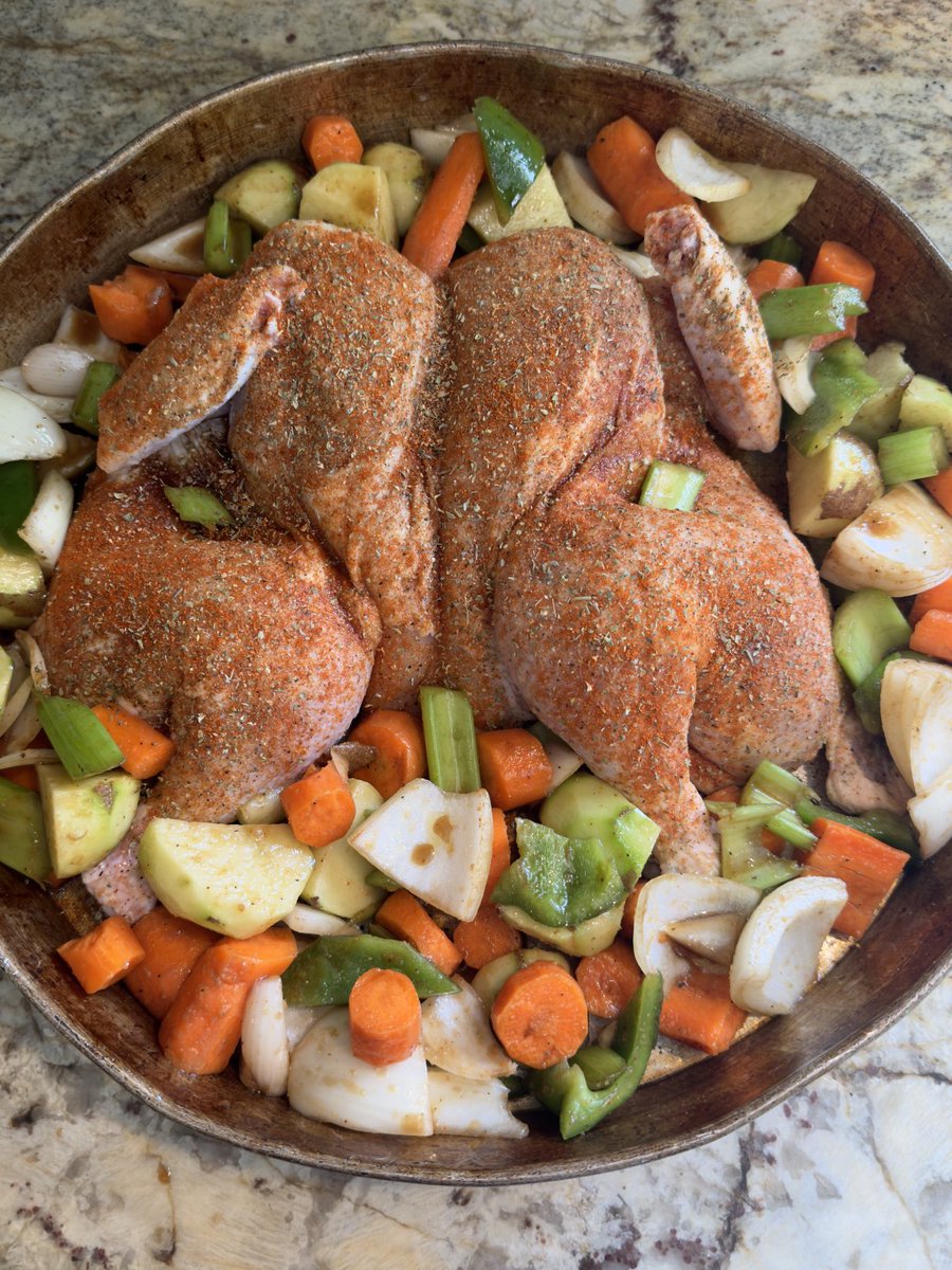 Baked chicken going in the oven.