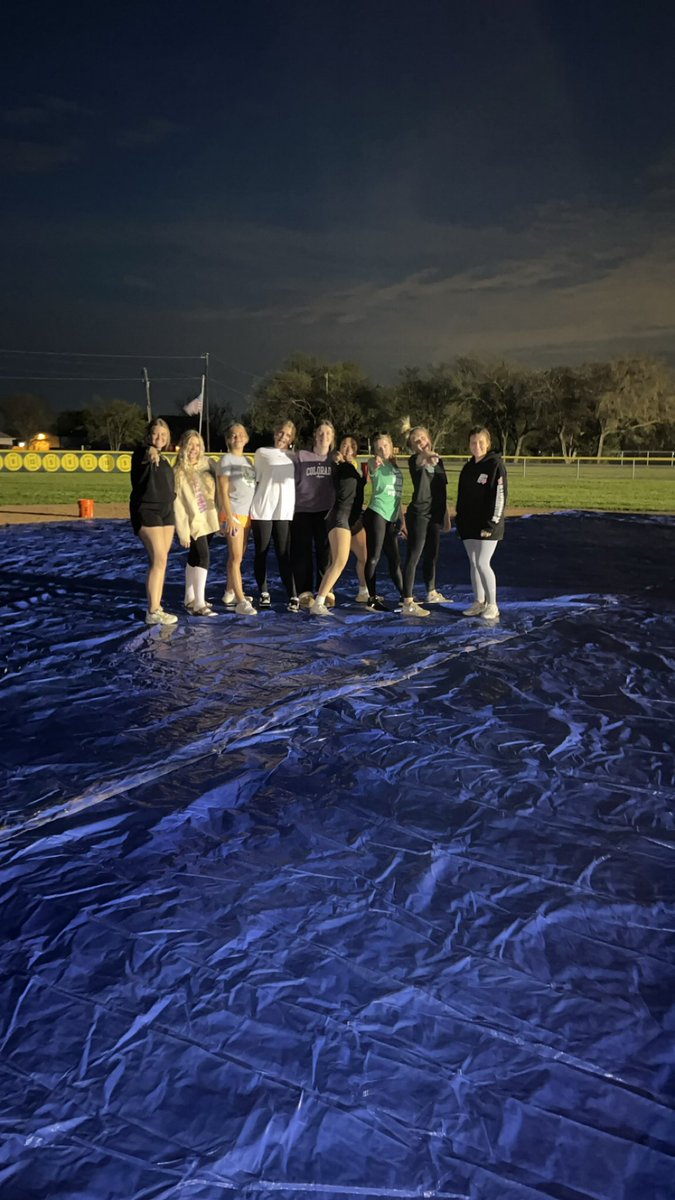 Tarp prep for Fridays game!!! Rain won’t stop us!
