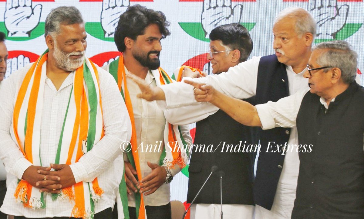 Jan Adhikar Party chief Pappu Yadav and his son Sarthak Ranjan join Congress in the presence of Congress leaders on wednesday. @IndianExpress photo by @anilsharma07