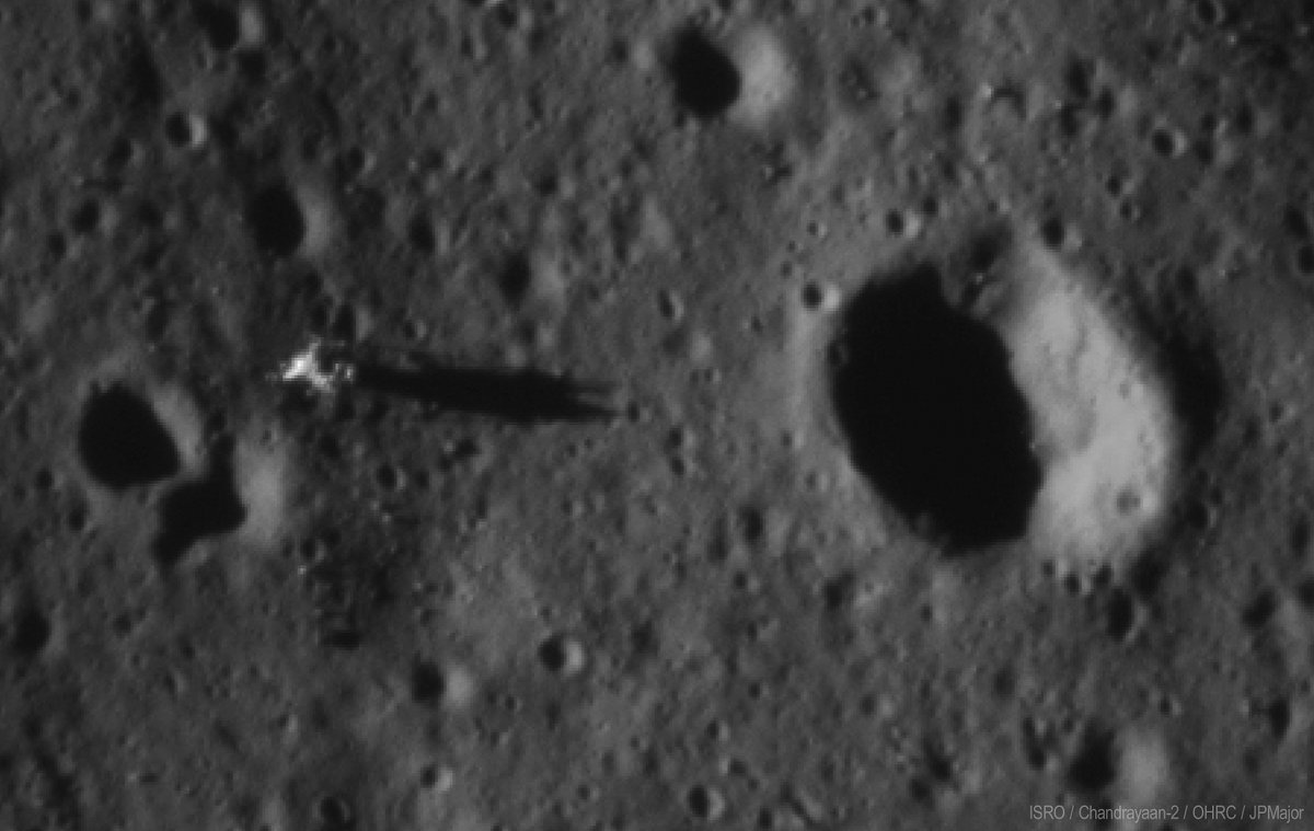 The Apollo 11 landing site with the lunar module descent stage casting a shadow toward Little West crater, imaged with the Orbiter High Resolution Camera on India's Chandrayaan-2 from an altitude of 100 km (62 miles) on April 2, 2021