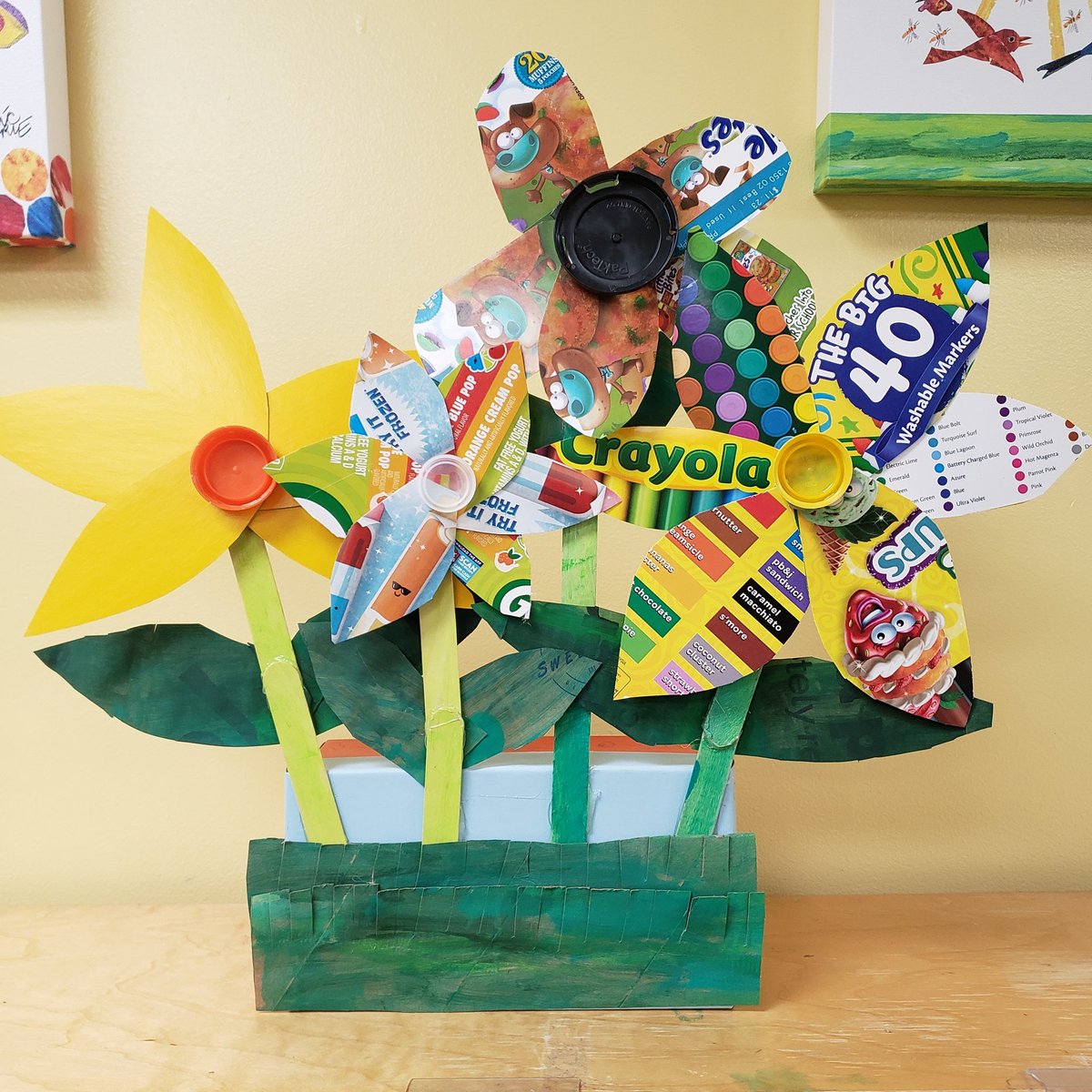 I'm overly proud of the "Recycling Art" assignment Canna and I made.