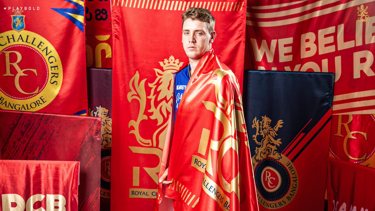 Cameron Green photoshoot with the RCB flag. #RCBUnbox #RCBxAlanWalker #RCBvsCSK #RCBChampions #ViratKohli #ViratKohli𓃵