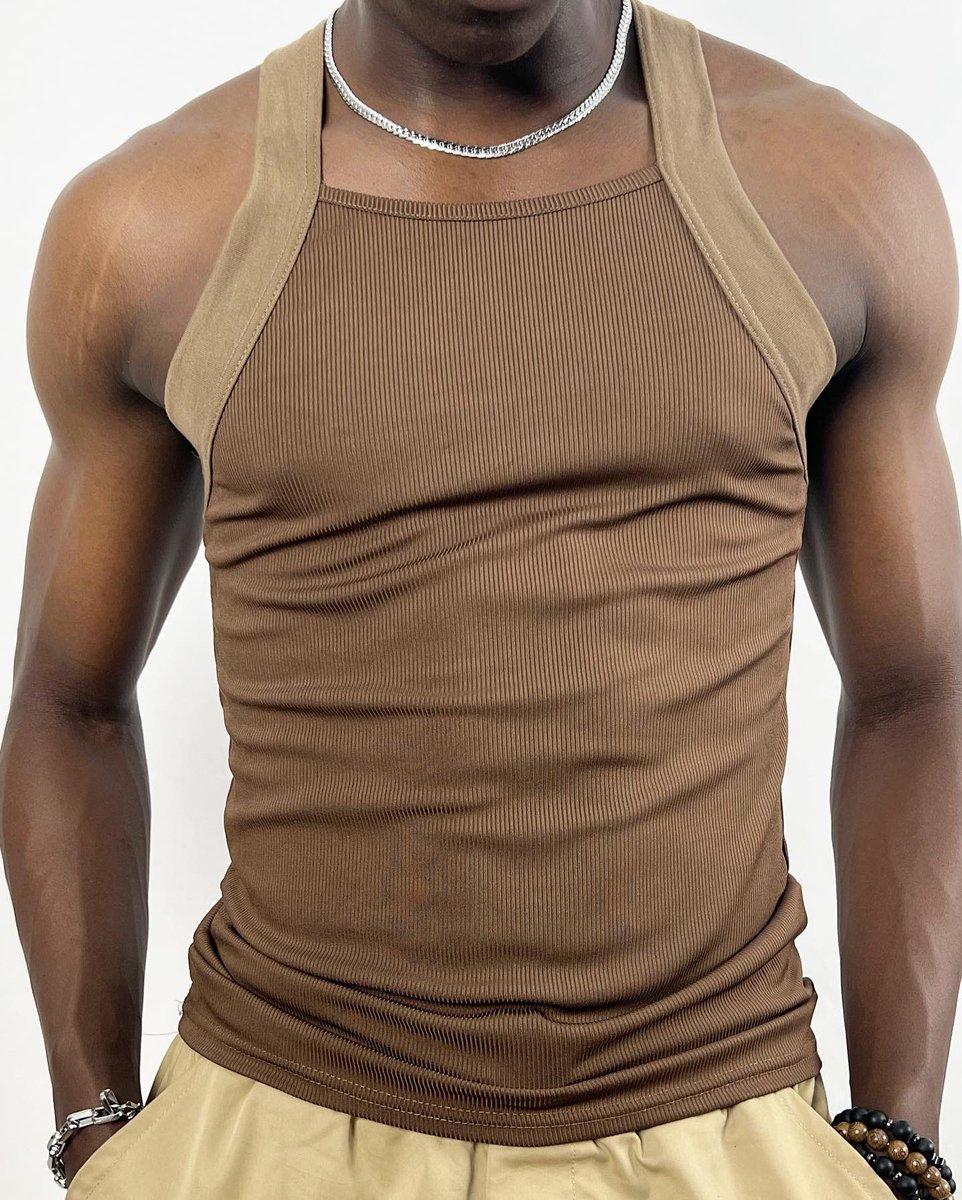 shopalpha_'s tweet photo. ALPHA DESIGN body fit square neck rib vest 

Price: 12,000 naira 

Availability colors 
Black-  M-2xl
Brown- M-2XL
White- M-XL

(Model is wearing size M) https://t.co/WY5Jjpoae8