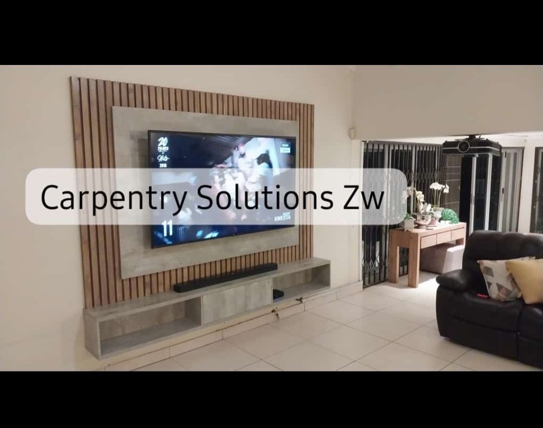 Donald0784's tweet photo. It can only be done by us. 

Natural concrete with solid wood slatted background. 

We fitted an 85" tv on it. (Total length 2.7m)
Contact Carpentry Solutions Zw on 0784754382 for your floating stands. https://t.co/gdGBsyd2Ds