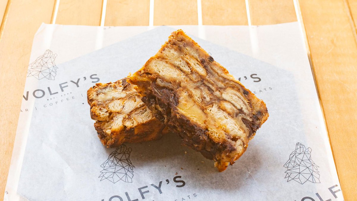 Indulge in our bestselling Wolfy's Chocolate Slice at #WolfysBar! 🤤 Made with rich chocolate and a secret ingredient, it's a must-try dessert! 😍 #SatisfyYourSweetTooth #DecadentDesserts 🍴 linktr.ee/wolfysbar