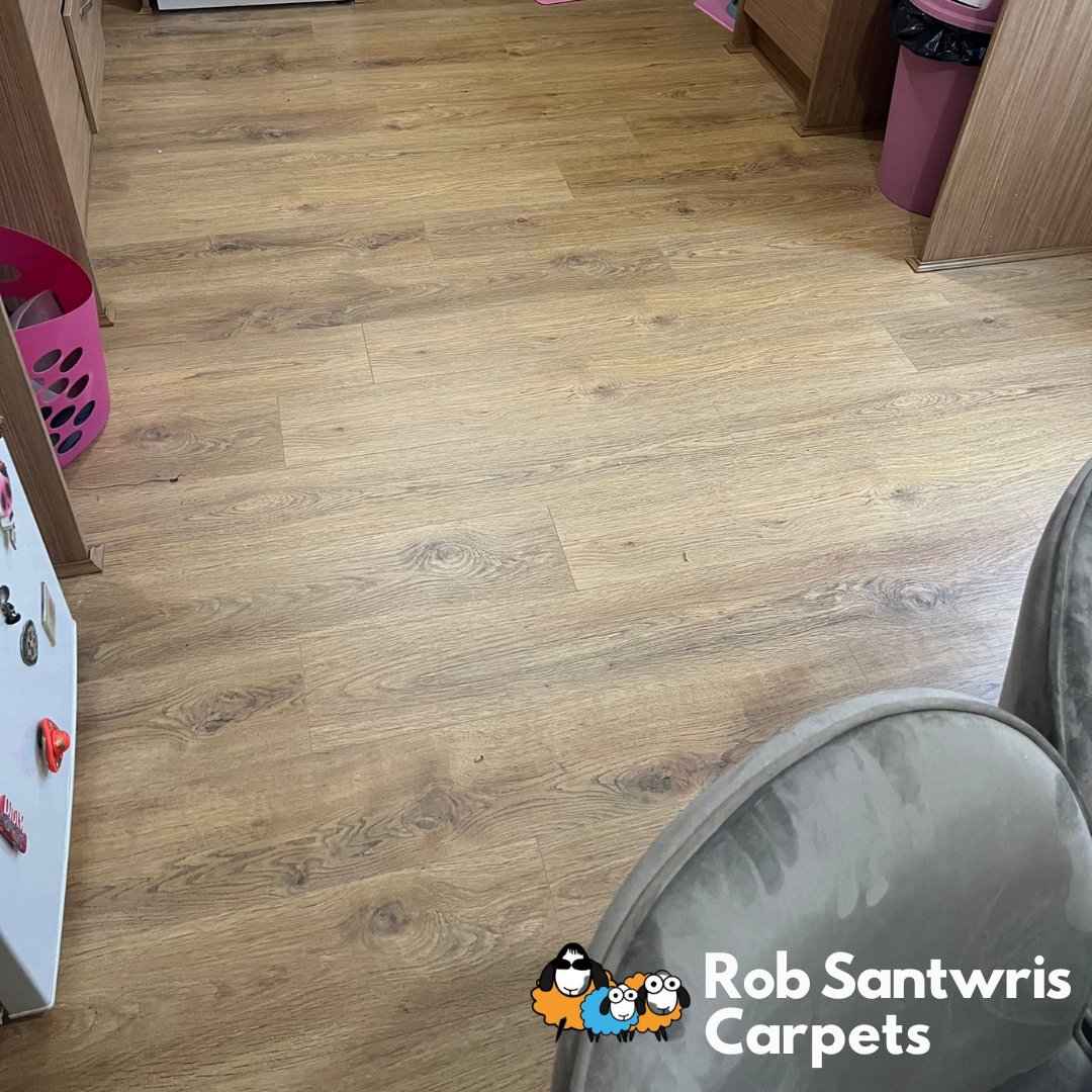 A beautiful laminate flooring project we completed recently 🔨 Compared to a solid wood floor that would easily perish when exposed to liquids, a laminate floor can withstand moisture, making it the perfect choice for homes with children and pets. 💦 #RobSantwrisCarpets