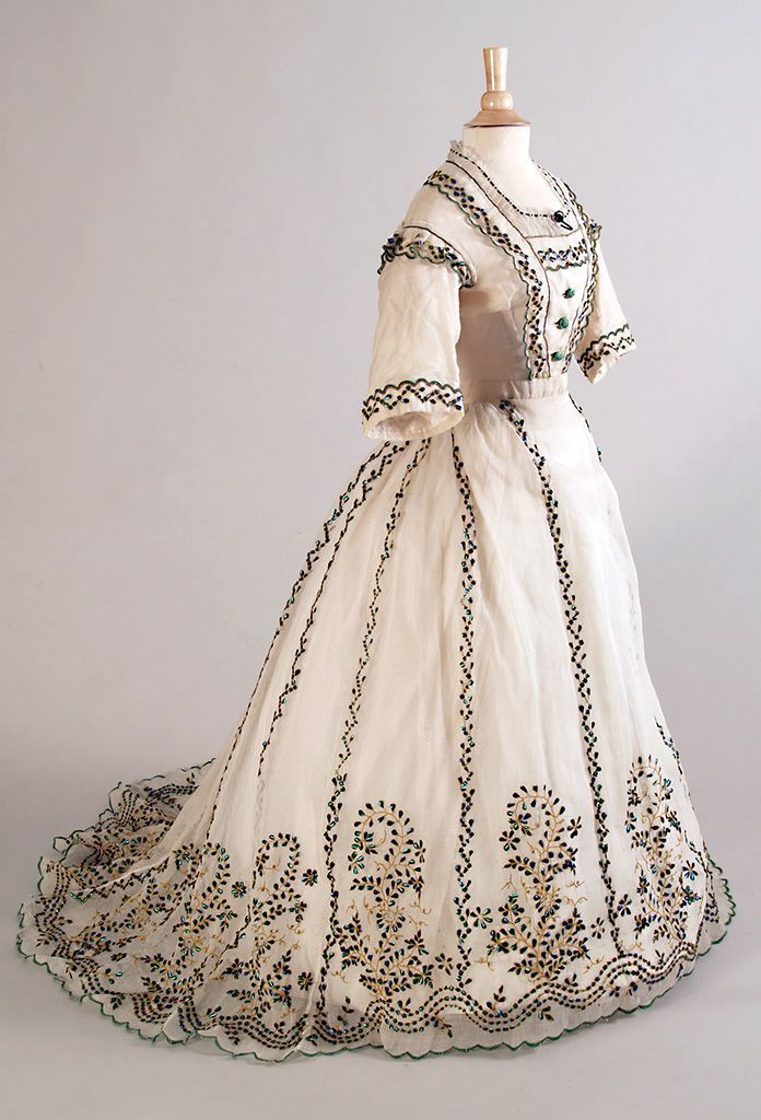 A #Frockingfabulous beetle wing frock of c.1863-67. No beetles were harmed in the creation of this bit of #fashionhistory - they shed their wings naturally! Via Kent State University.