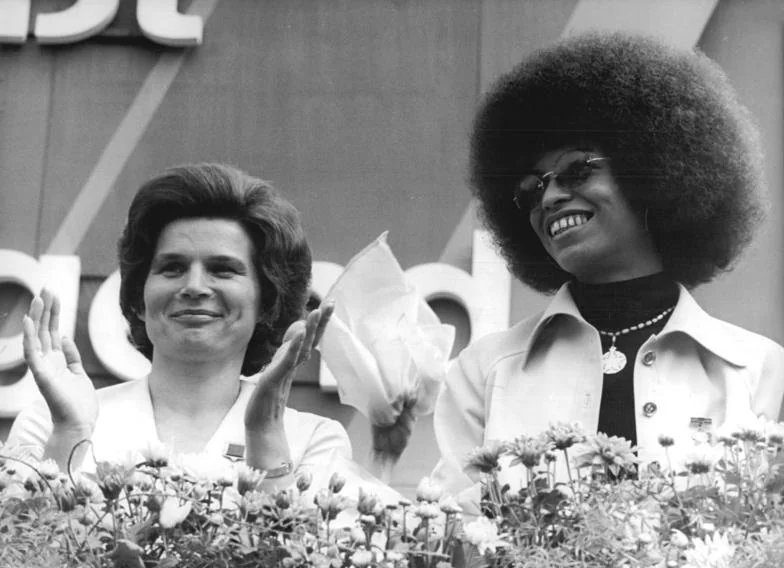 Soviet cosmonaut and first woman in space Valentina Tereshkova with American civil rights activist Angela Davis at the 10th World Festival of Youth and Students in Berlin, GDR, 1973