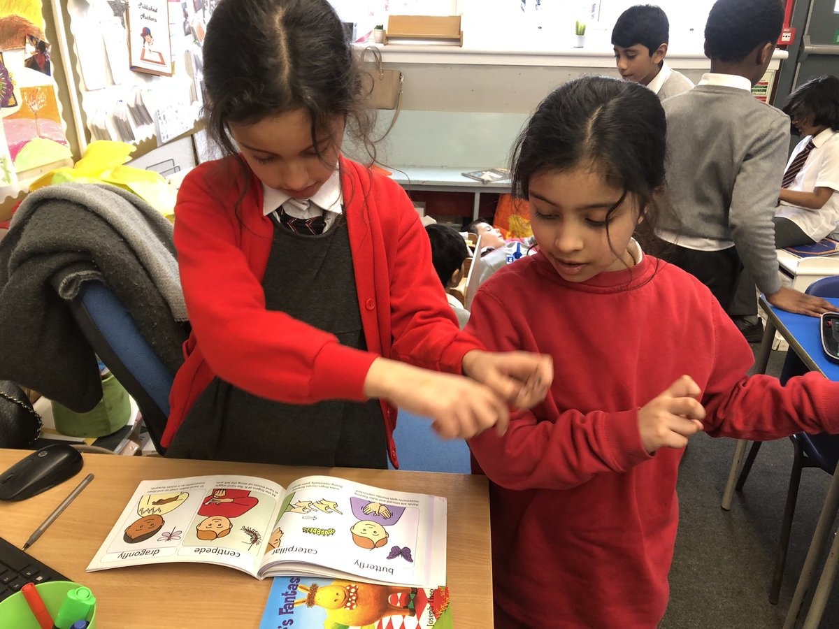 stcadocsprimary's tweet image. P3/4 were learning ‘The British finger spelling alphabet’ as part of British Sign Language Week. We had lots of fun spelling our names and looking at some great books. 😃 #SignLanguageWeek @BDA_Deaf