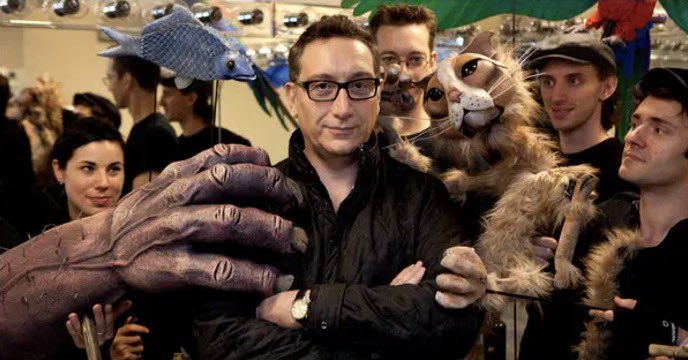 TectonicTheater's tweet image. In honor of World Puppetry Day, let's mark the occasion with this #tbt snapshot featuring Moisés Kaufman alongside the talented artists & enchanting puppets from Montsalvatge's "El Gato con Botas (Puss in Boots)!" This incredible show made its debut at The New Victory Theater.