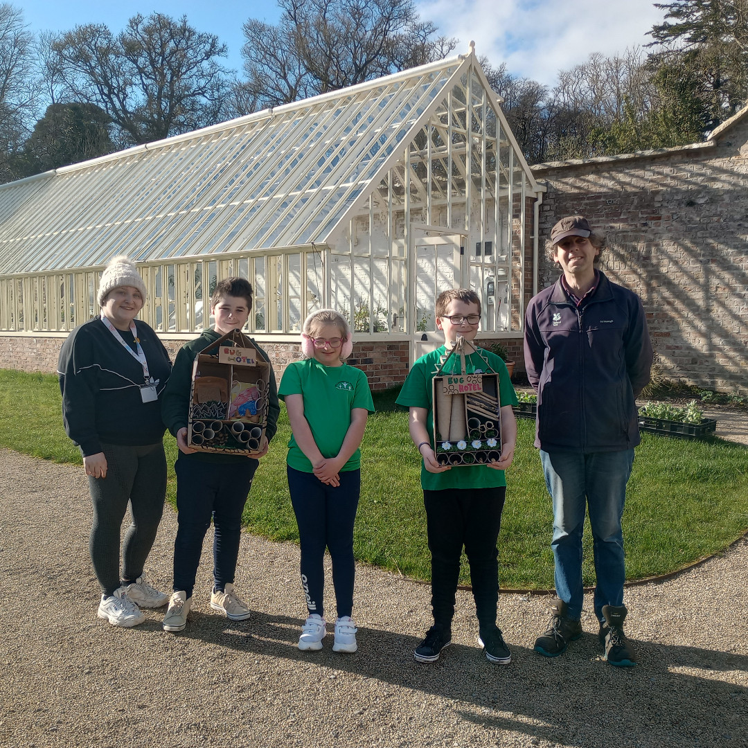 The young people in our Lakeland Families Service delivered hand-made insect hotels to Florencecourt Estate as part of their activity for British Science Week. Mark, who kindly gave them a tour, is pictured with Dylan, Juliette, Jake and Support Worker Louise. #positivefuturesni