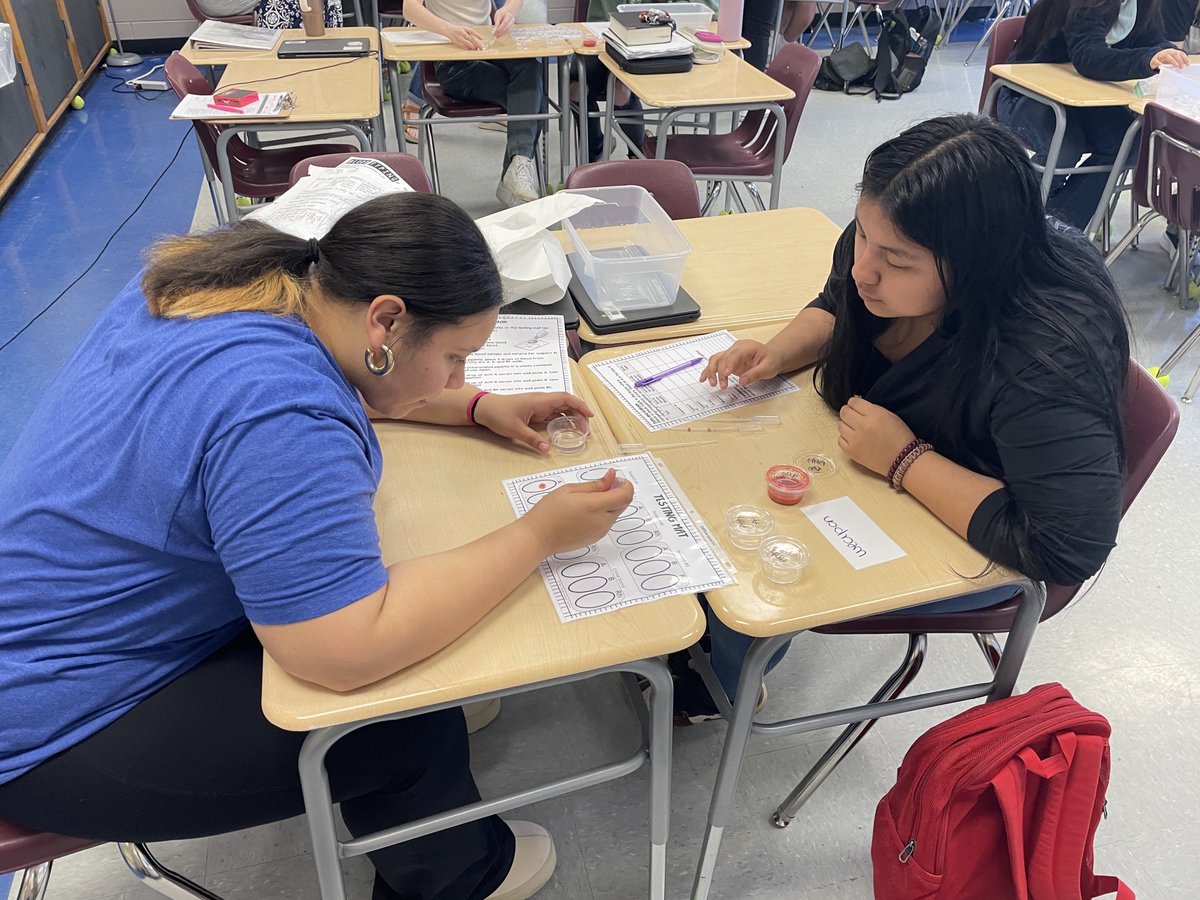 Mrs. Roper’s Forensics class doing an experiment on blood types.
