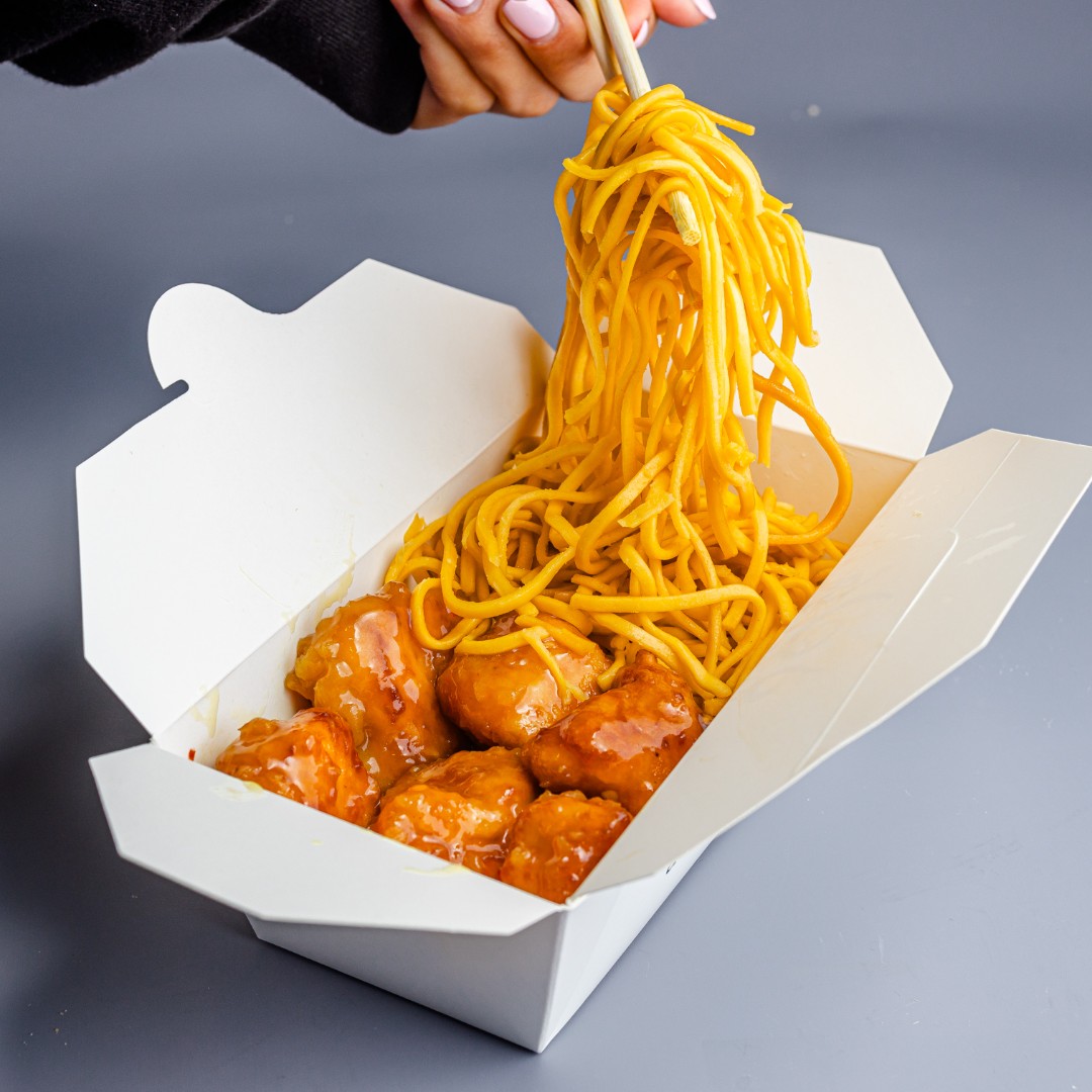 Have you tried our Sticky Orange Chicken yet? 😍 Served with delicious egg noodles or soft white rice! #chowasianuk #noodles #asianfood #rice #takeaway #friedchicken #orangechicken #servicestation