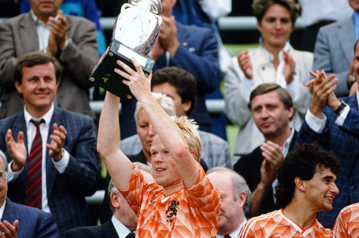 #Euro1988 Ronald Koeman raises the UEFA European Championship trophy in the air after Netherlands beat the Soviet Union 2-0 to become champions in the final of the UEFA Euro 1988 European football championship at the Olympiastadion in Munich, West Germany on 25th June 1988.