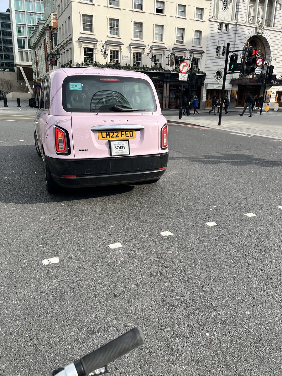 LM22FEO , London cabbie caught in no man’s land on a red and blocking pedestrian access to cross the road.

Spotted this morning near Victoria.