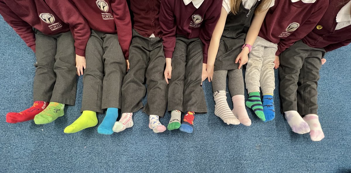 Dosbarth Maple wearing our odd socks to celebrate World Down Syndrome Day!