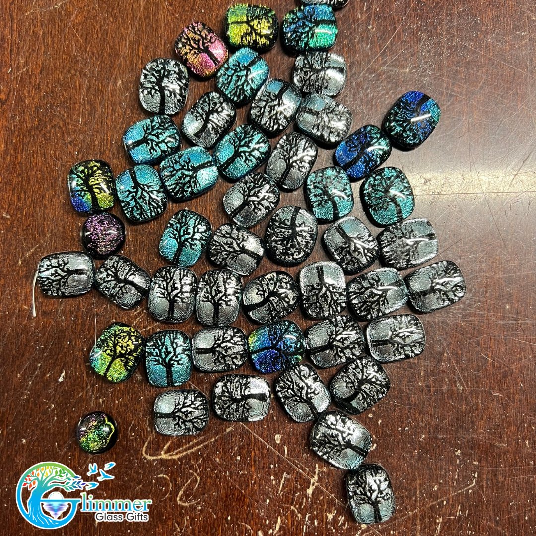 Finally, our laser is recharged and back in action. It's time to get caught up on all of our customer orders. This is what the laser produced yesterday. These are mini pendants, (Butterflies, Red Cardinal, Curly Q Tree, & Round Tree #6) Thoughts? #MakeLifeGlimmer #MadeInUSA