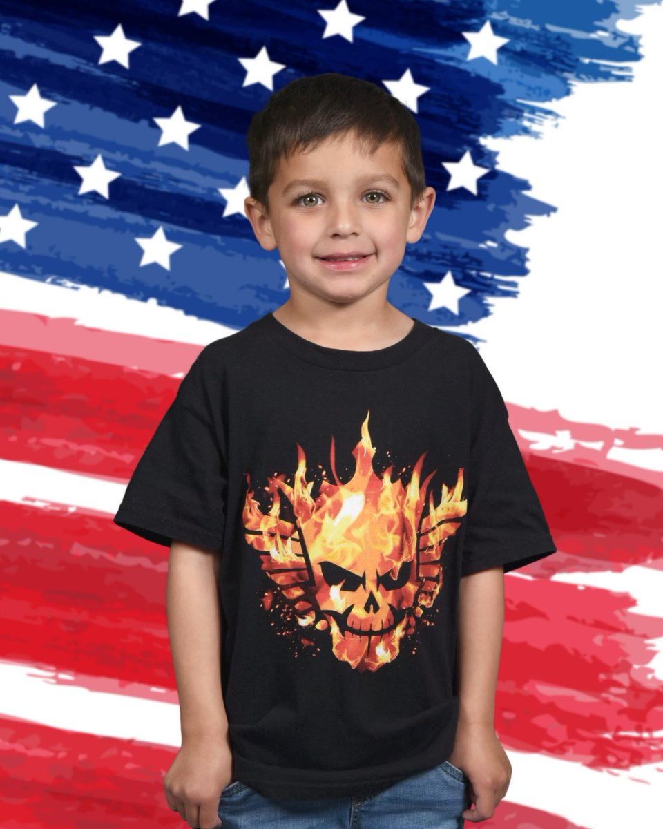 DaLiability's tweet image. When we saw the background options for picture day, our son immediately picked the flag one and excitedly exclaimed how he could wear his @CodyRhodes shirt! He’s our little American Nightmare!